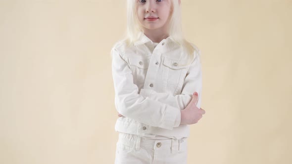 Portrait of Awesome Albino Kid with Blonde Hair