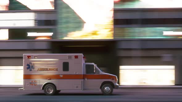 Ambulance drives down the street with lights flashing at night