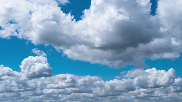 Cumulus Cirrus Clouds Move in the Blue Sky. Time Lapse