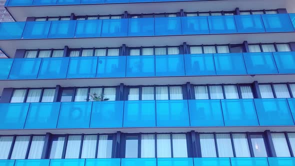 facade of a modern mirrored office building was removed from a drone. close-up