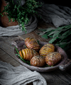 Potatoes in a wooden plate, baked with herbs and spices. Food ph - PhotoDune Item for Sale