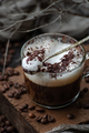 Cappuccino with milk foam in a spoon on a wooden board closeup. - PhotoDune Item for Sale
