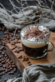 Cappuccino coffee with milk foam and chocolate closeup. Low key - PhotoDune Item for Sale