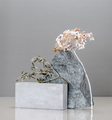 Art installation using concrete blocks, golden plants and natura - PhotoDune Item for Sale
