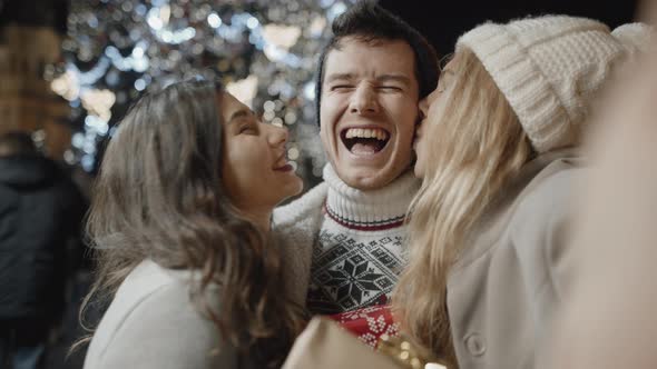 Festive Friends Taking Selfie at Xmas Night