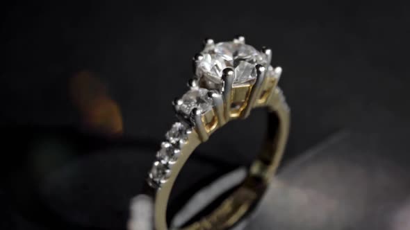 Extreme Detailed of Diamond Ring Close Up Shot While Rotating on Dark Background