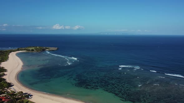 Drone flying around Nusa Dua beach in Bali