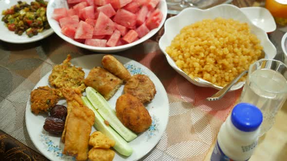 High Angle View of Iftar on Plate on Table During Ramadan
