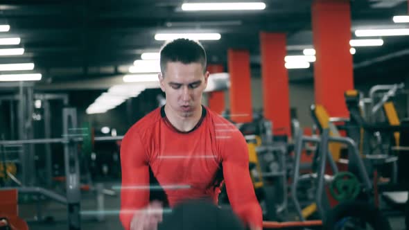 Tired Man Trains with Gym Ball During Workout