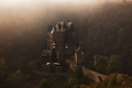 Burg Eltz castle in the early morning fog - PhotoDune Item for Sale