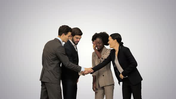 Diverse Adult Business People Joining Hands Together Team Spirit on Gradient Background.