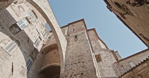 Old Medieval Perugia Town Stone and Brick Buildings establisher.Medium Shot. Friends Italian Trip in