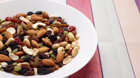 Close Up of Many Mixed Nuts on Plate