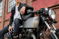 Brutal man sit on cafe racer custom motorbike. - PhotoDune Item for Sale