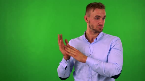 Young Handsome Business Man Wakes Up and He Is Suprised - Green Screen - Studio