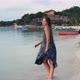 Young Woman Dancing Spinning Around Vacation Travel on Tropical Beach - VideoHive Item for Sale