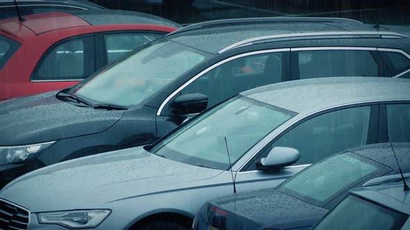 Parked Cars In Rainstorm