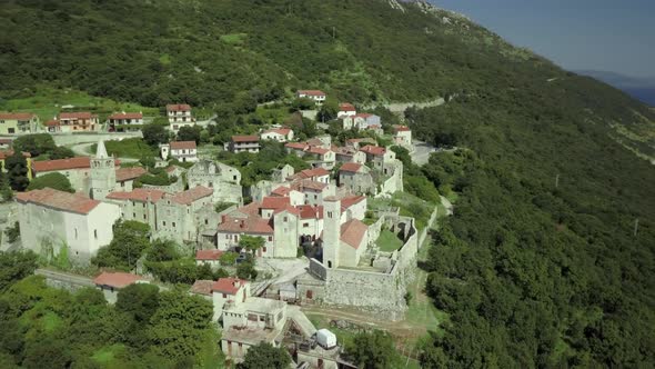 Aerial view to the old town among the mountains in Croatia