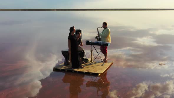 Playing Music in the Sky, Band Is Performing Ethnic Music, Clouds Around Them 