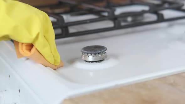 Cleaning the kitchen. 