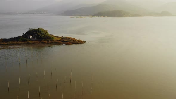 Flying over seaweed and fish farms in China.