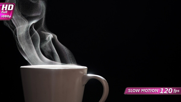 Steam Rises From A Mug Of Coffee