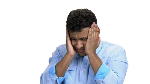 Young Man Suffering From Headache