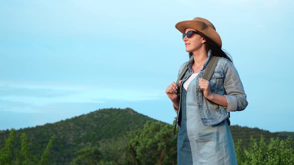 Happy Travel Female Admiring Amazing Nature Landscape at Sky and Mountain Background