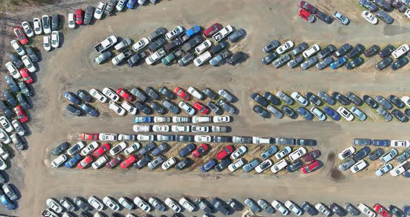 Aerial top down view of auction distribution center cars parked in car parking lot