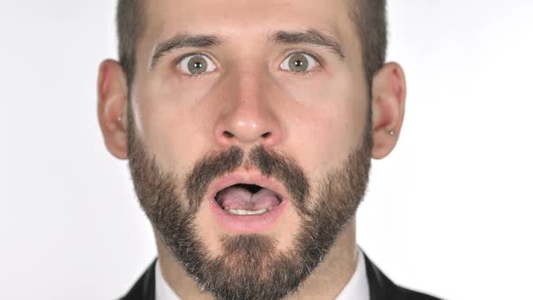 Close Up of Shocked Wondering Beard Businessman Face