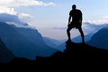 Man hiking success silhouette in mountains - PhotoDune Item for Sale
