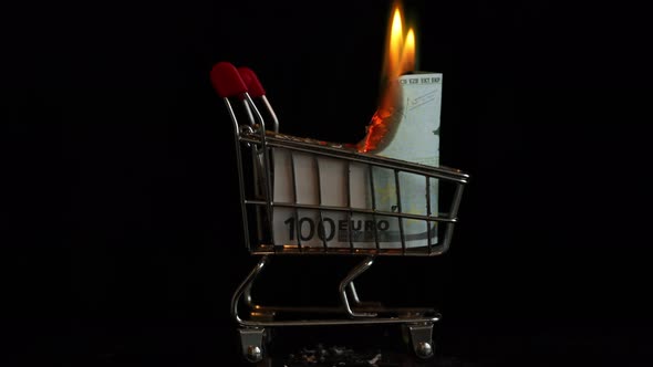 Euro Burn in a Basket From the Supermarket on a Black Background