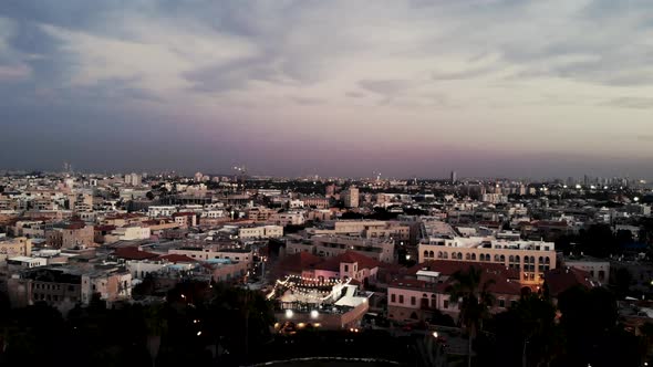 Flying above Jaffo Tel Aviv at marvelous sunset drone shot 4K