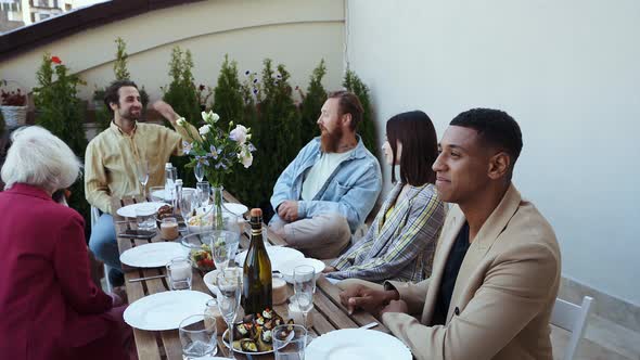 Family and friends having dinner together