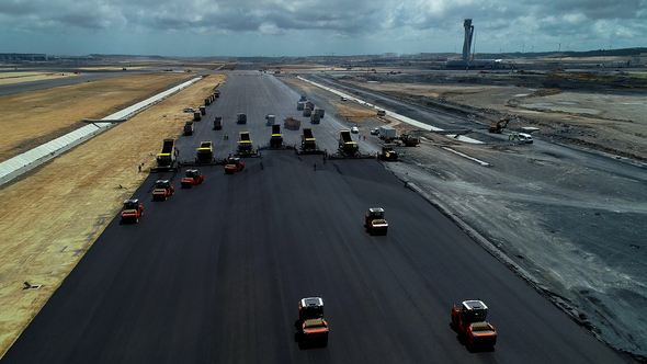 Asphalting Construction Works On An Airport Runway