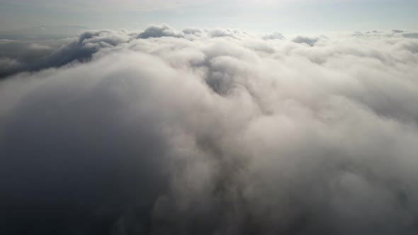 Aerial view look down white fog cloud