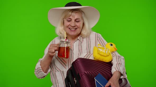 Mature Woman Traveler Tourist Passenger Drinking Cocktail Holding Passport Tickets Luggage Bag