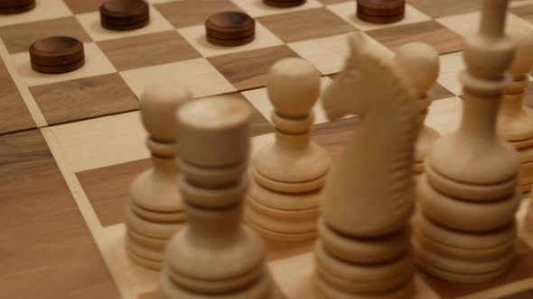 chess and checkers on the one board. spinning around. close up view