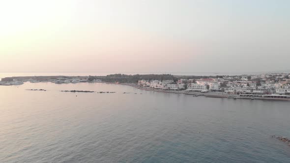 4K Aerial Drone View of Papho's Sea boulevard at dusk, Cyprus