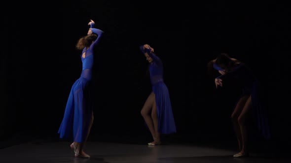 Slow Motion of Professional Ballerinas Dancing in Studio