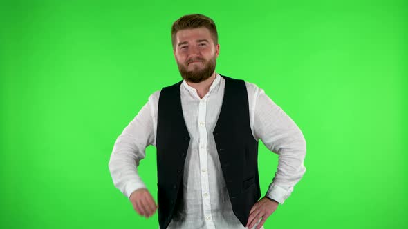 Man Is Reporting and Tells a Lot of Interesting Informations. Green Screen