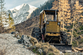 Bulldozer resting in high mountains after work - PhotoDune Item for Sale