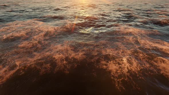 Ocean Waves Reflecting Sun With Rays 4k