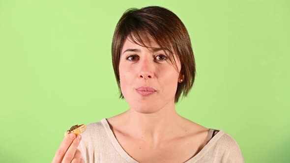 Young Woman Eating Chocolate Cream