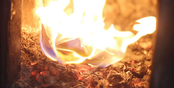 Burning Paper Ship In The Furnace