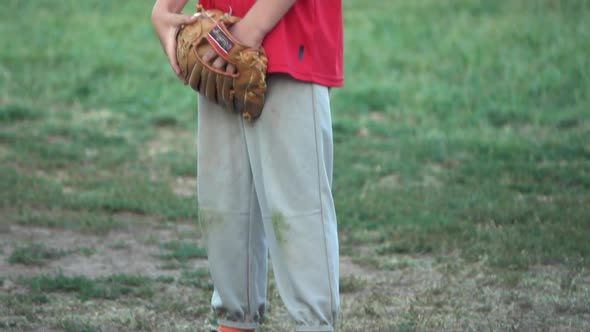 Boys practice for a little league baseball game.