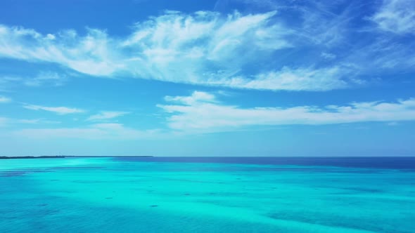 Aerial view sky of luxury lagoon beach vacation by turquoise water and white sand background of a pi