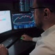 Trader Works with Stock Market Data Timelapse - VideoHive Item for Sale
