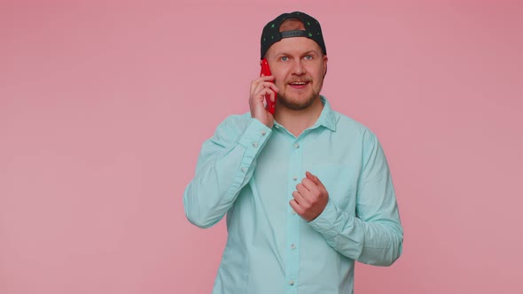 Man Talking on Phone Pleasant Mobile Conversation Using Smartphone with Friends Telling Good News