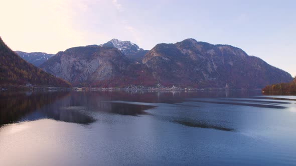 Flying Over the Lake Towards the Town of Hallstatt in Austria